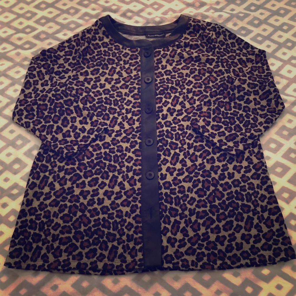 Leopard print cardigan with faux-leather detail!